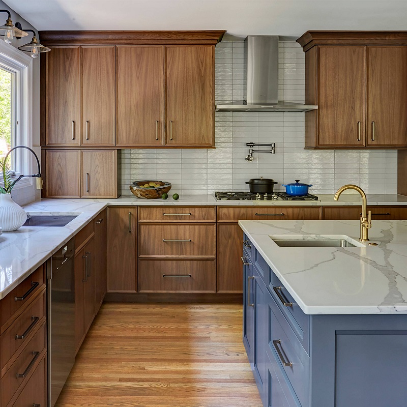 Walnut kitchen cabinets with traditional blue base cabinet
